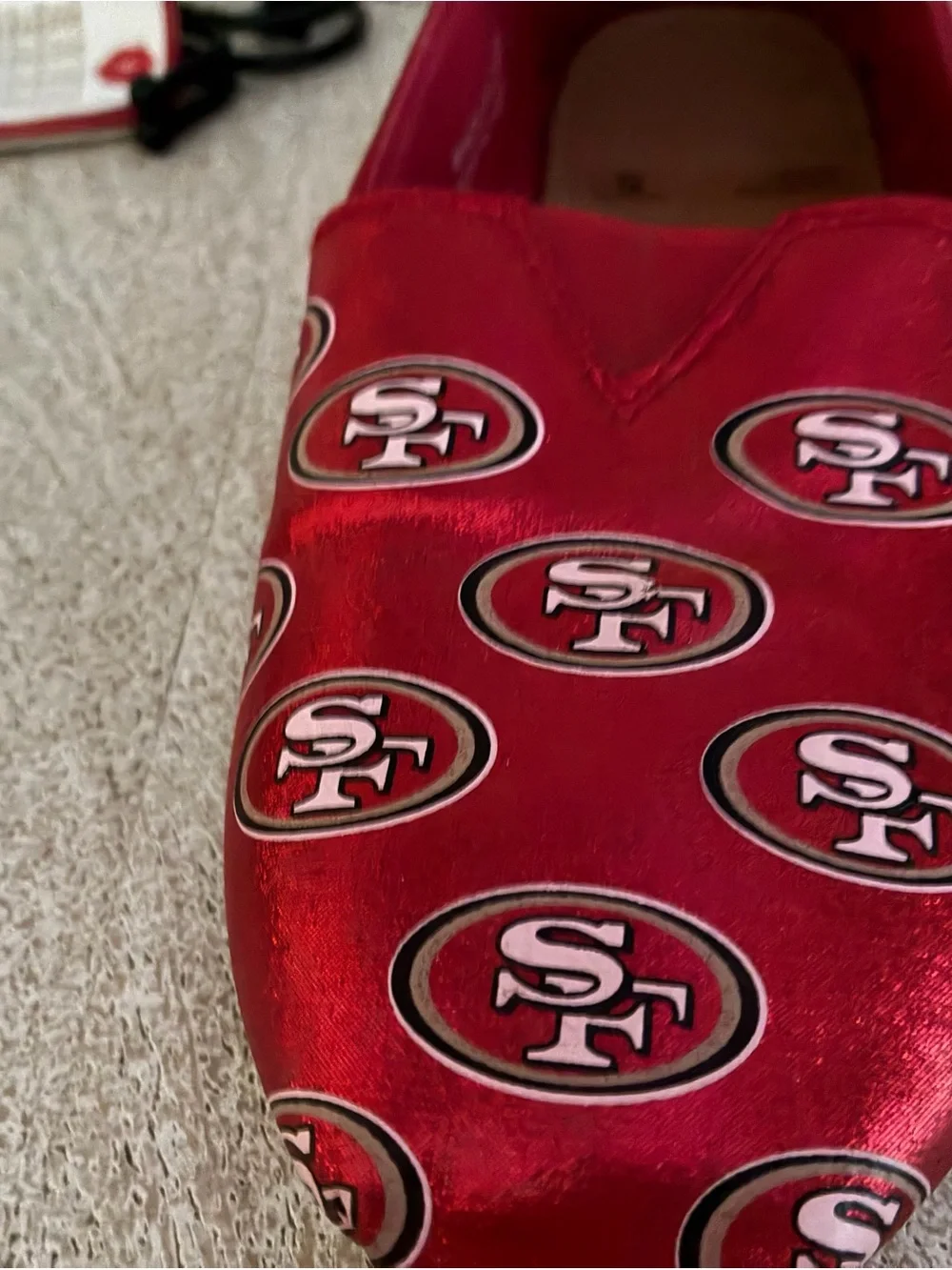 Red Metallic Slip-On Flats with Team Logo Pattern